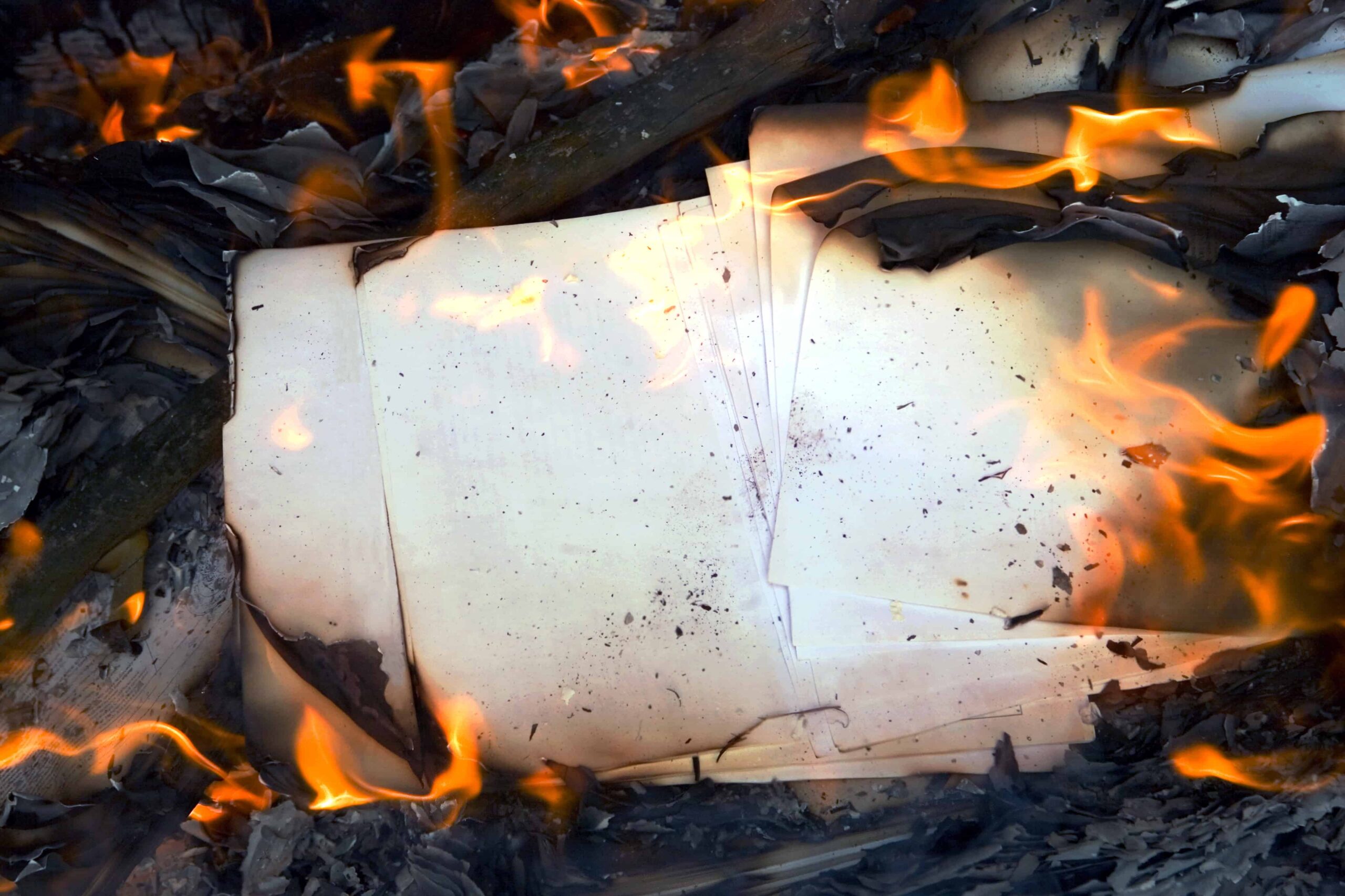 image depicting burning documents